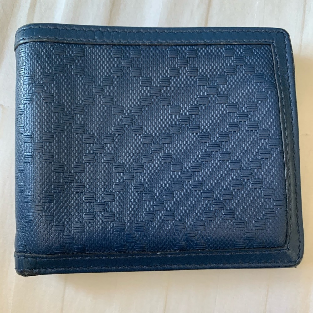 Mena authentic used gucci wallet